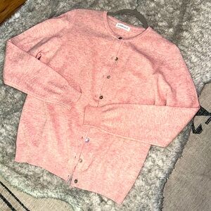 NWOT. Woman’s 100% wool Lanpulux button down sweater. Size L.